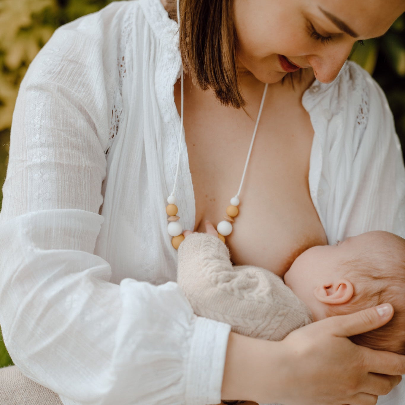 Collier d’allaitement Mawen Materne en silicone et bois perles blanc jaune