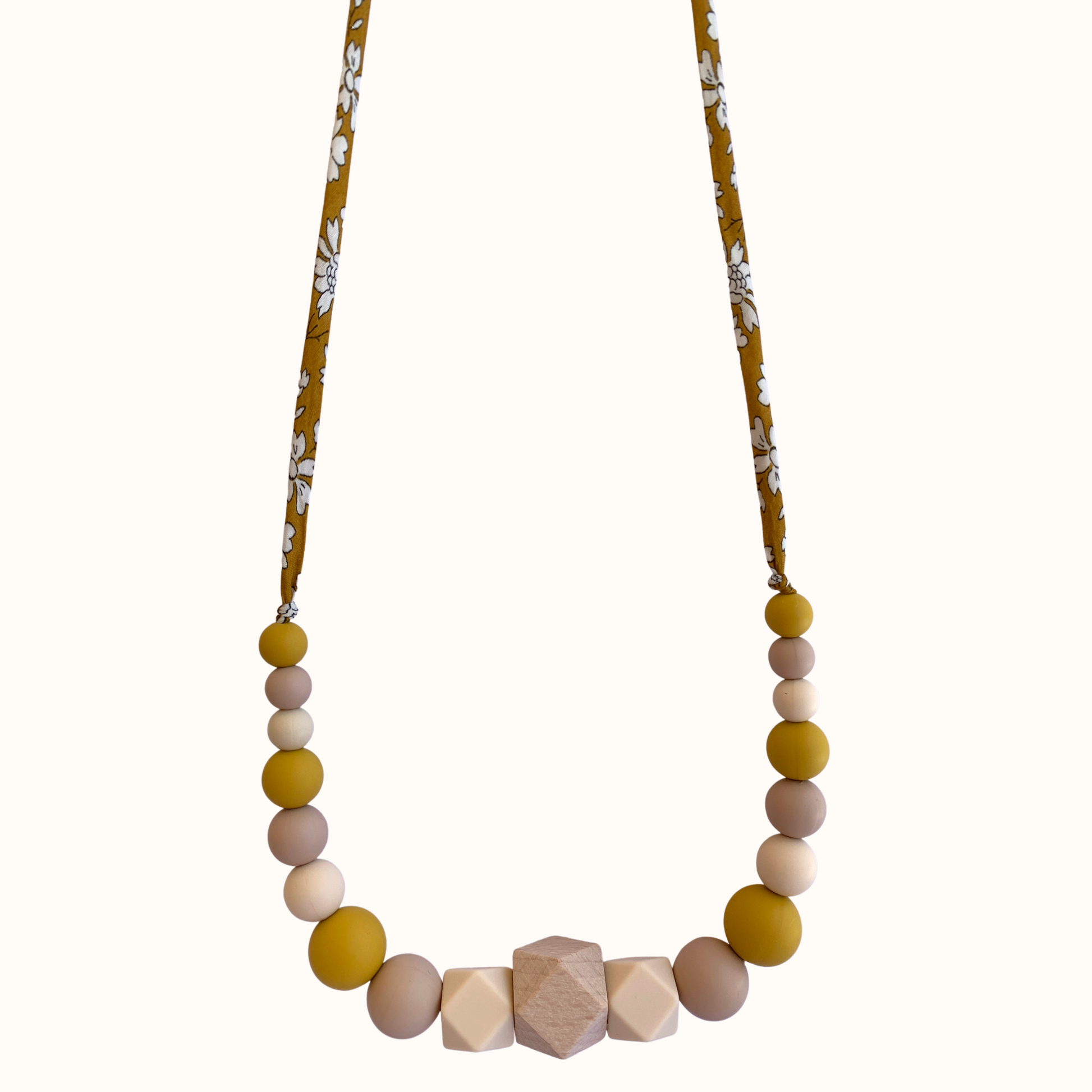 Collier d’allaitement Mawen Materne en bois et silicone perles blanc jaune
