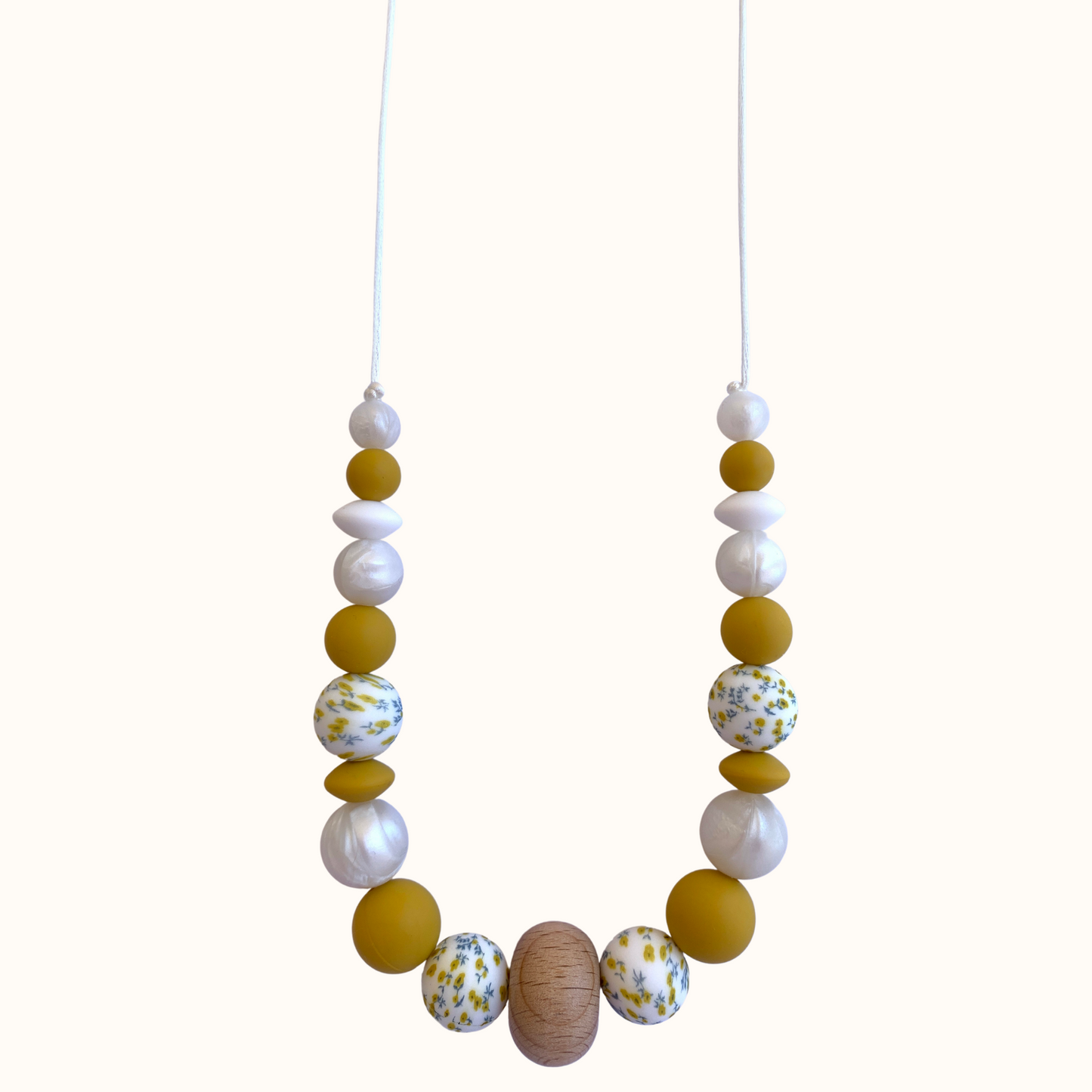 Collier d’allaitement Mawen Materne en silicone perles blanc jaune nacré